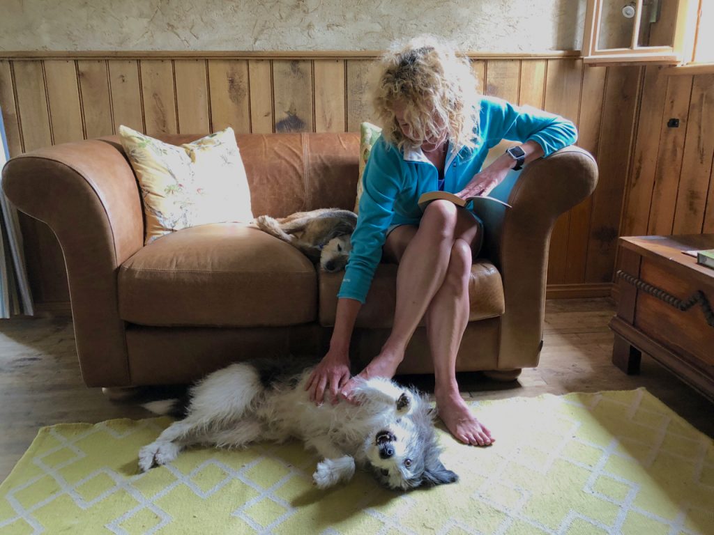 Kate Humble on Indigo Grandad Sofa with Badger at Poachers Cabin
